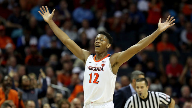 CHARLOTTE, NORTH CAROLINA - MARCH 14: De'Andre Hunter #12 of the Virginia Cavaliers reacts after a play against the North Carolina State Wolfpack during their game in the quarterfinal round of the 2019 Men's ACC Basketball Tournament at Spectrum Center on March 14, 2019 in Charlotte, North Carolina.