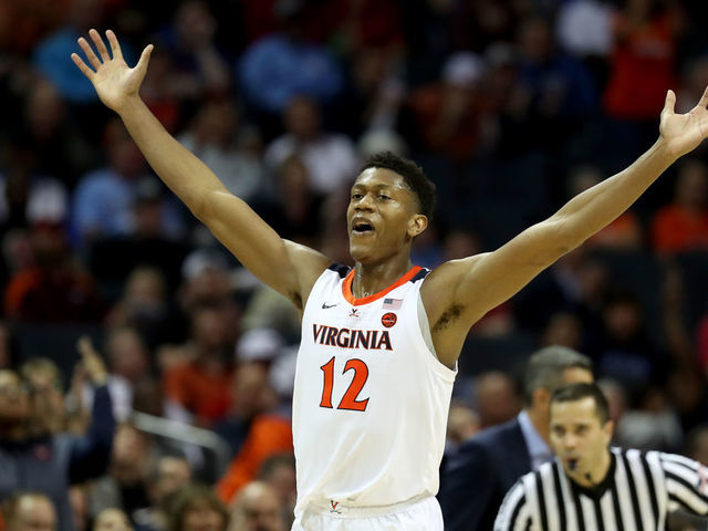 CHARLOTTE, NORTH CAROLINA - MARCH 14: De'Andre Hunter #12 of the Virginia Cavaliers reacts after a play against the North Carolina State Wolfpack during their game in the quarterfinal round of the 2019 Men's ACC Basketball Tournament at Spectrum Center on March 14, 2019 in Charlotte, North Carolina.