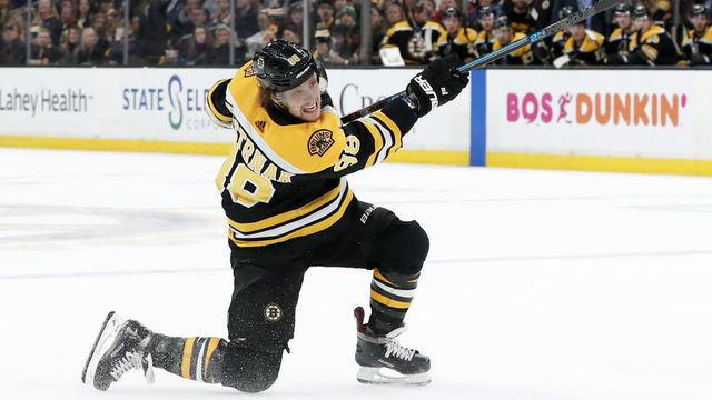 BOSTON, MA - JANUARY 17: Boston Bruins right wing David Pastrnak (88) follows through on a shot during a game between the Boston Bruins and the St. Louis Blues on January 17, 2019, at TD Garden in Boston, Massachusetts.