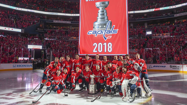 WASHINGTON, DC - OCTOBER 3: at The Washington Capitals gather for a team photo as the 2018 Stanley Cup Banner is raised into the rafters of the Capital One Arena on Wednesday, October 3, 2018.