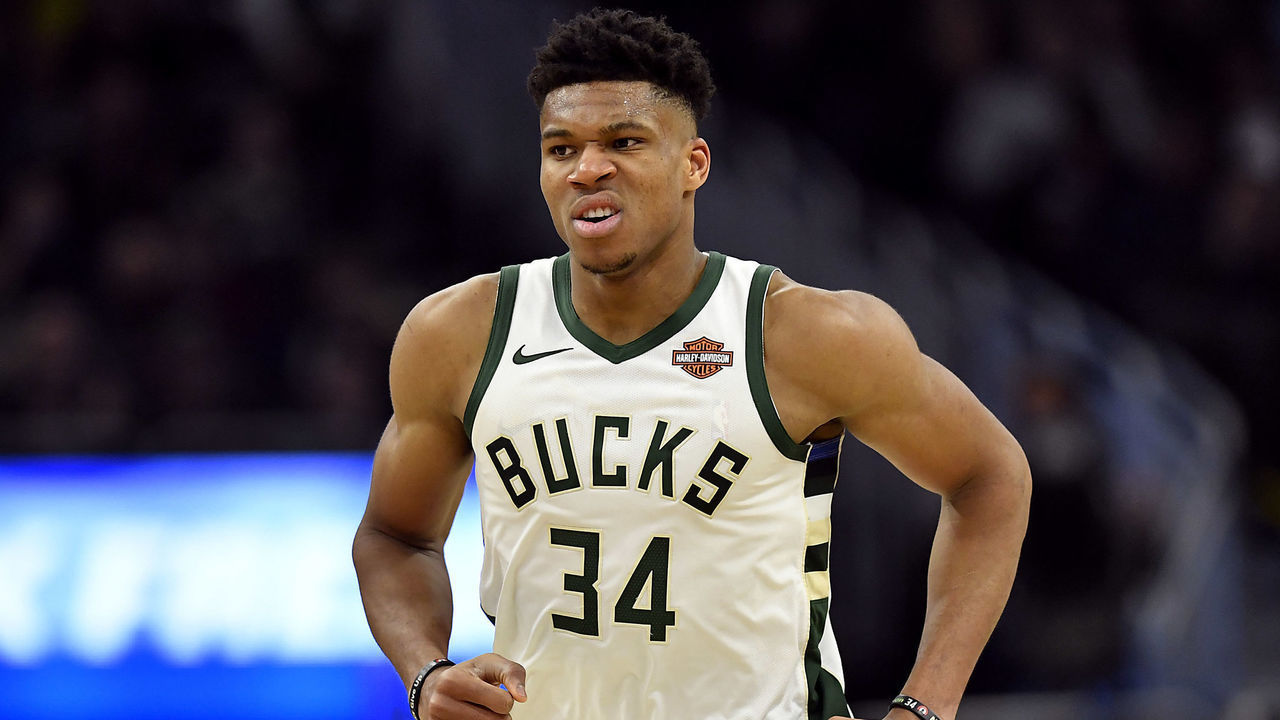 MILWAUKEE, WISCONSIN - MARCH 07: Giannis Antetokounmpo #34 of the Milwaukee Bucks reacts after scoring against the Indiana Pacers at Fiserv Forum on March 07, 2019 in Milwaukee, Wisconsin.