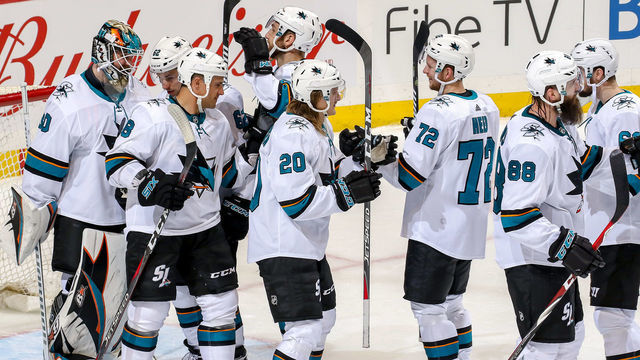 WINNIPEG, MB - MARCH 12: San Jose Sharks players celebrate on the ice following a 5-4 victory over the Winnipeg Jets at the Bell MTS Place on March 12, 2019 in Winnipeg, Manitoba, Canada.