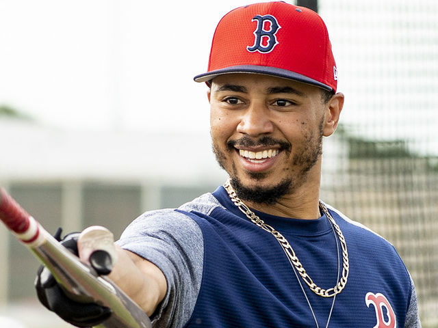 FT. MYERS, FL - FEBRUARY 21: Mookie Betts #50 of the Boston Red Sox reacts during a team workout on February 21, 2019 at JetBlue Park at Fenway South in Fort Myers, Florida.