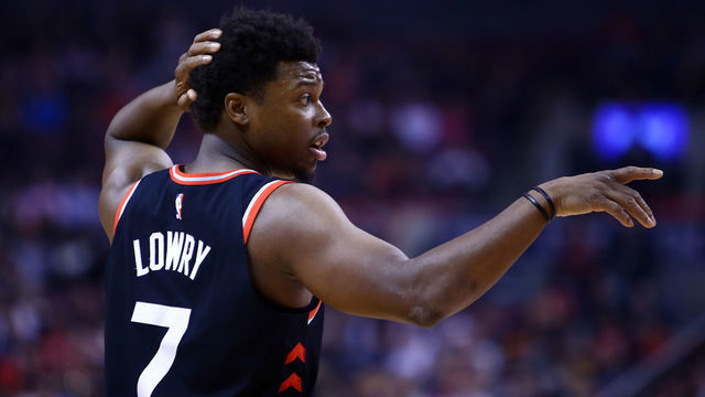 TORONTO, ON - MARCH 18: Kyle Lowry #7 of the Toronto Raptors gestures to a teammate during the first half of an NBA game against the New York Knicks at Scotiabank Arena on March 18, 2019 in Toronto, Canada.