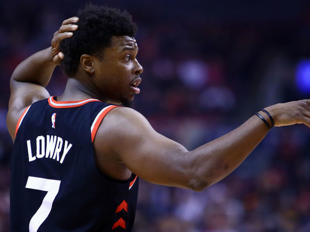 TORONTO, ON - MARCH 18: Kyle Lowry #7 of the Toronto Raptors gestures to a teammate during the first half of an NBA game against the New York Knicks at Scotiabank Arena on March 18, 2019 in Toronto, Canada.