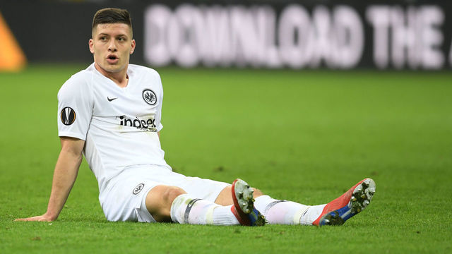 14 March 2019, Italy, Mailand: Soccer: Europa League, knockout round, round of sixteen, second leg: Inter Milan - Eintracht Frankfurt at the Guiseppe Meazza Stadium. Frankfurt's Luka Jovic, the scorer of the decisive goal, sits on the grass after the final whistle. Photo: Arne Dedert/dpa