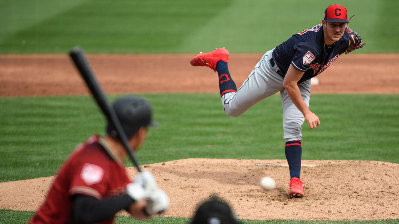 SCOTTSDALE, ARIZONA - MARCH 07: Trevor Bauer #47 of the Cleveland Indians delivers a pitch to Kelby Tomlinson #37 of the Arizona Diamondbacks during the spring training game at Salt River Fields at Talking Stick on March 07, 2019 in Scottsdale, Arizona.
