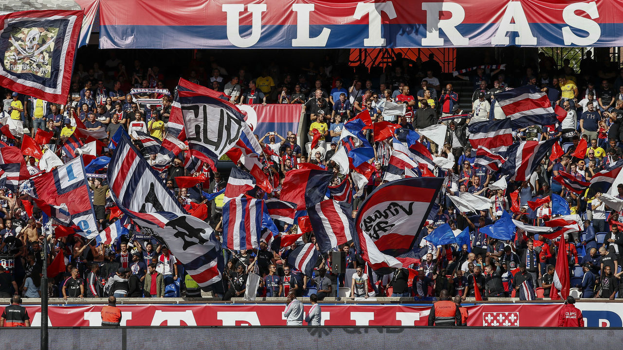 PARIS, FRANCE - AUGUST 25: Ultras of PSG are enjoying the atmosphere during the Ligue 1 Conforama game between Paris Saint-Germain and Angers SCO at Parc des Princes on August 25, 2018 in Paris, France.