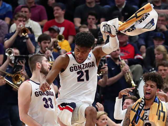 SALT LAKE CITY, UTAH - MARCH 21: Rui Hachimura #21 of the Gonzaga Bulldogs and teammate Killian Tillie #33 celebrate against the Fairleigh Dickinson Knights during the first half in the first round of the 2019 NCAA Men's Basketball Tournament at Vivint Smart Home Arena on March 21, 2019 in Salt Lake City, Utah. The Gonzaga Bulldogs won 87-49.