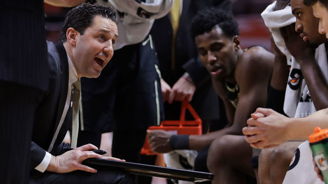 KNOXVILLE, TN - FEBRUARY 19: Head coach Bryce Drew of the Vanderbilt Commodores huddles with his team during a timeout in the game against the Tennessee Volunteers at Thompson-Boling Arena on February 19, 2019 in Knoxville, Tennessee. Tennessee won the game 58-46.