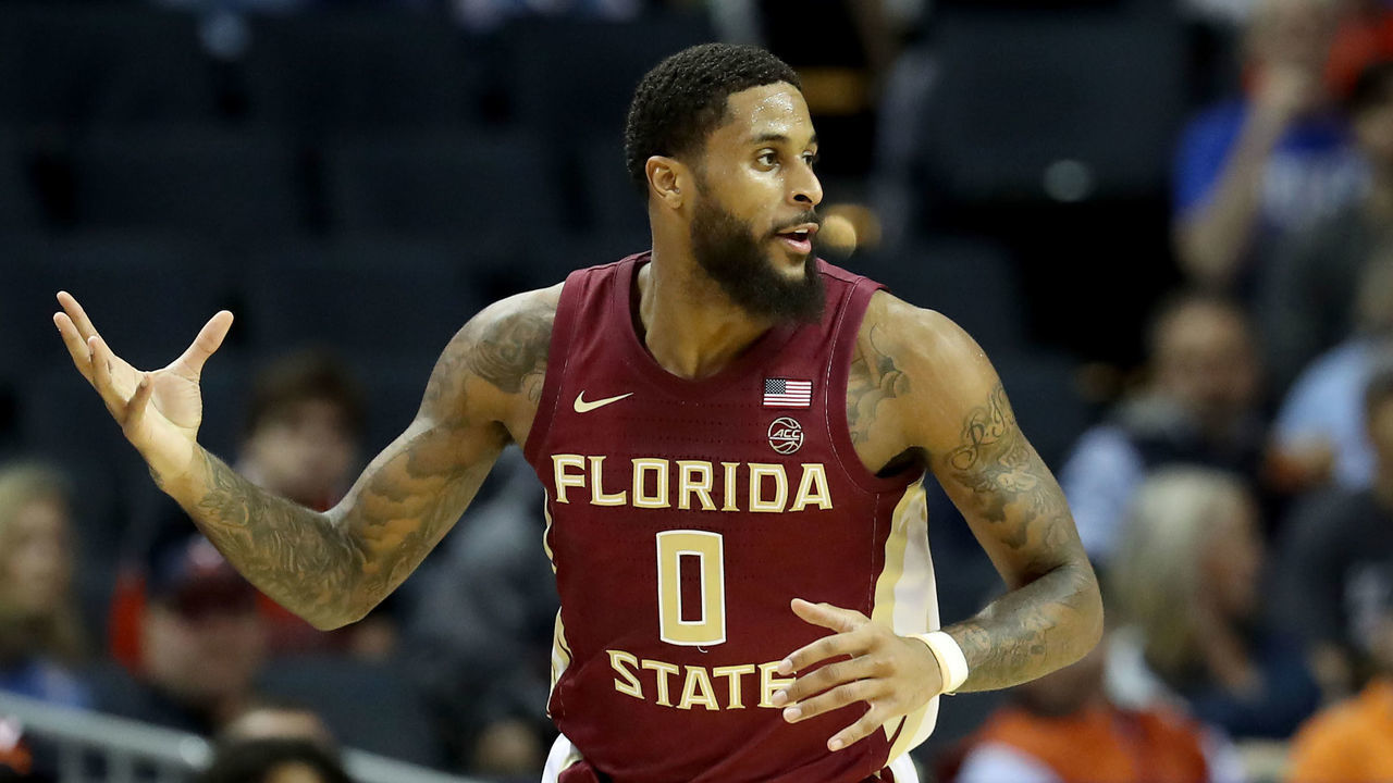 CHARLOTTE, NORTH CAROLINA - MARCH 15: Phil Cofer #0 of the Florida State Seminoles reacts after a play against the Virginia Cavaliers during their game in the semifinals of the 2019 Men's ACC Basketball Tournament at Spectrum Center on March 15, 2019 in Charlotte, North Carolina.