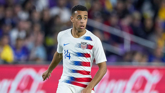 ORLANDO, FL - MARCH 21: United States midfielder Tyler Adams (14) dribbles the ball in game action during an International friendly match between the United States and Ecuador on March 21, 2019 at Orlando City Stadium in Orlando, FL.