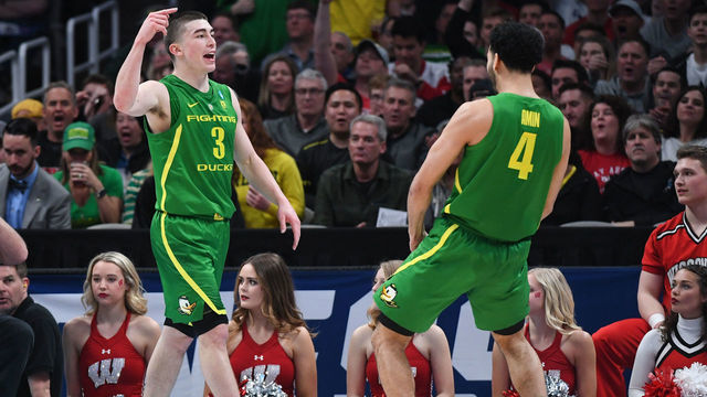 SAN JOSE, CA - MARCH 22: Payton Pritchard #3 and Ehab Amin #4 of the Oregon Ducks celebrate against the Wisconsin Badgers in the first round of the 2019 NCAA Men's Basketball Tournament held at SAP Center on March 22, 2019 in San Jose, California.