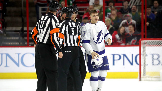 RALEIGH, NC - MARCH 21: Yanni Gourde #37 of the Tampa Bay Lightning is ejected for an illegal hit to the head to Jordan Staal #11 of the Carolina Hurricanes (not pictured) during an NHL game against on March 21, 2019 at PNC Arena in Raleigh, North Carolina.