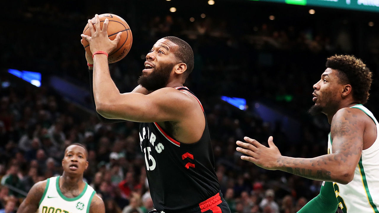 BOSTON, MA - JANUARY 16: Greg Monroe #15 of the Toronto Raptors drives to the basket during a game against the Boston Celtics at TD Garden on January 16, 2019 in Boston, Massachusetts.