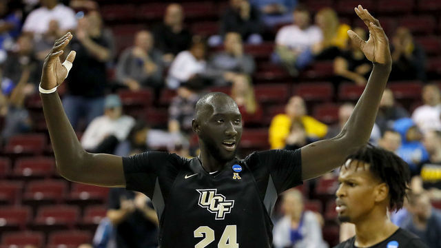 COLUMBIA, SOUTH CAROLINA - MARCH 22: Tacko Fall #24 of the UCF Knights celebrates his teams lead against the Virginia Commonwealth Rams in the second half during the first round of the 2019 NCAA Men's Basketball Tournament at Colonial Life Arena on March 22, 2019 in Columbia, South Carolina.