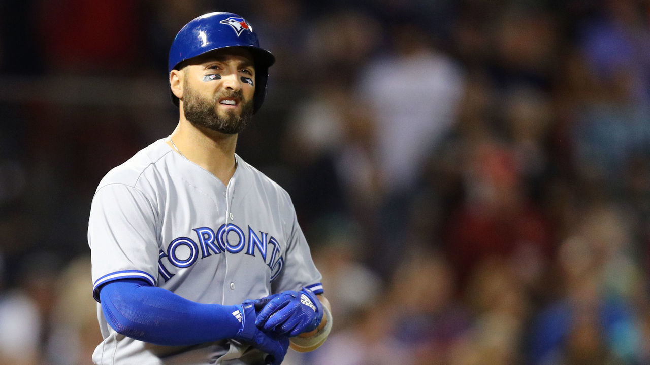 BOSTON, MA - SEPTEMBER 13: Kevin Pillar #11 of the Toronto Blue Jays walks to first after being struck by a pitch from Joe Kelly #56 of the Boston Red Sox during the eighth inning at Fenway Park on September 13, 2018 in Boston, Massachusetts.