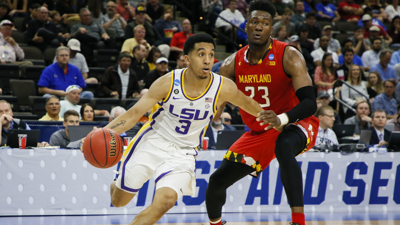 JACKSONVILLE, FL - MARCH 23: LSU Tigers guard Tremont Waters (3) dribbles the ball as Maryland Terrapins forward Bruno Fernando (23) defends during a game at VyStar Veterans Memorial Arena on March 23, 2019 in Jacksonville, Florida.