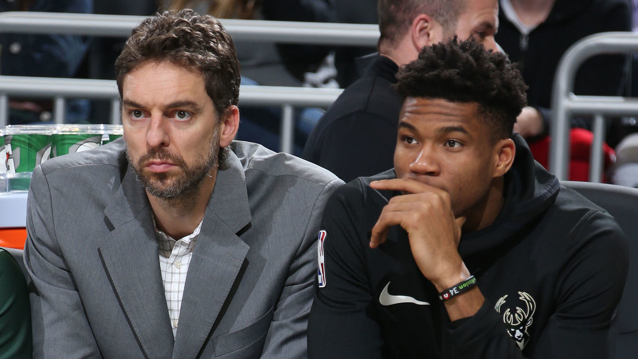 MILWAUKEE, WI - MARCH 19: Pau Gasol #17 and Giannis Antetokounmpo #34 of the Milwaukee Bucks look on during a game against the Los Angeles Lakers on March 19, 2019 at the Fiserv Forum Center in Milwaukee, Wisconsin. Mandatory Copyright Notice: Copyright 2019 NBAE .