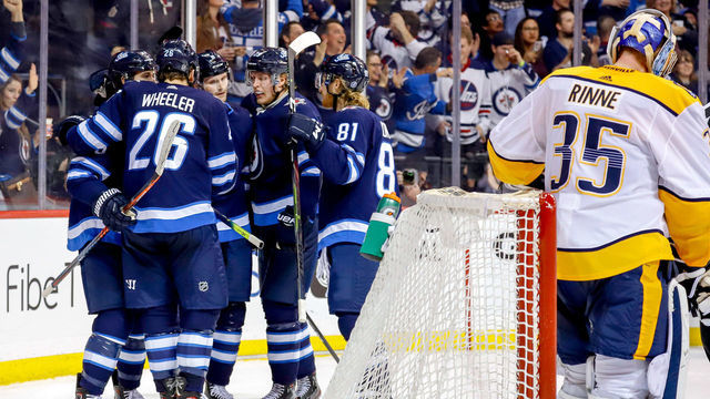 WINNIPEG, MB - MARCH 1: Mark Scheifele #55, Blake Wheeler #26, Jacob Trouba #8 ,Patrik Laine #29 and Kyle Connor #81 of the Winnipeg Jets celebrate a second period goal against the Nashville Predators at the Bell MTS Place on March 1, 2019 in Winnipeg, Manitoba, Canada.