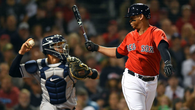 BOSTON, MA. - OCTOBER 7: Rafael Devers #11 of the Boston Red Sox stikes out over Gary Sanchez #24 of the New York Yankees in in the seventh inning of Game 2 of Major League Baseball's American League Division Series at Fenway Park in Boston, Massachusetts on October 7, 2018.