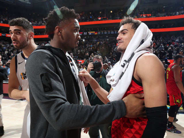 SALT LAKE CITY, UT - FEBRUARY 1: Donovan Mitchell #45 of the Utah Jazz and Trae Young #11 of the Atlanta Hawks talk after a game on February 1, 2019 at vivint.SmartHome Arena in Salt Lake City, Utah. Mandatory Copyright Notice: Copyright 2019 NBAE