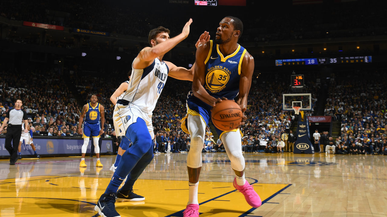 OAKLAND, CA - MARCH 23: Kevin Durant #35 of the Golden State Warriors looks to shoot turnaround jumper against the Dallas Mavericks on March 23, 2019 at ORACLE Arena in Oakland, California. NOTE TO USER: User expressly acknowledges and agrees that, by downloading and or using this photograph, user is consenting to the terms and conditions of Getty Images License Agreement. Mandatory Copyright Notice: Copyright 2019 NBAE