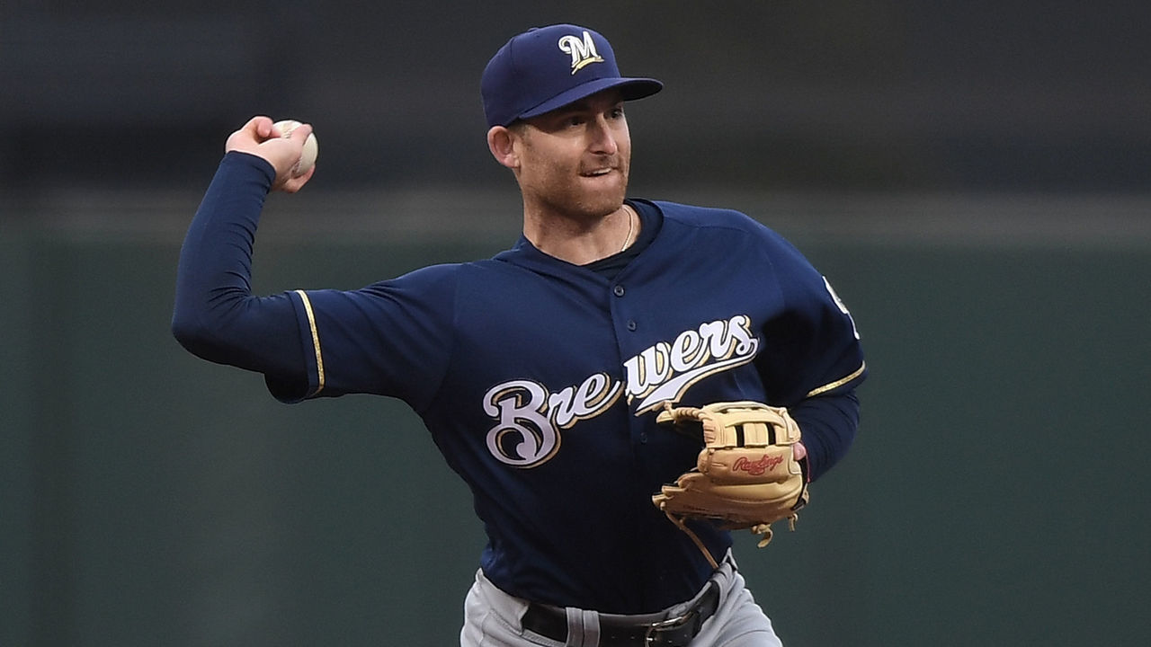 SAN FRANCISCO, CA - JULY 26: Brad Miller #10 of the Milwaukee Brewers throws to first base throwing the runner out against the San Francisco Giants in the bottom of the first inning at AT&T Park on July 26, 2018 in San Francisco, California.
