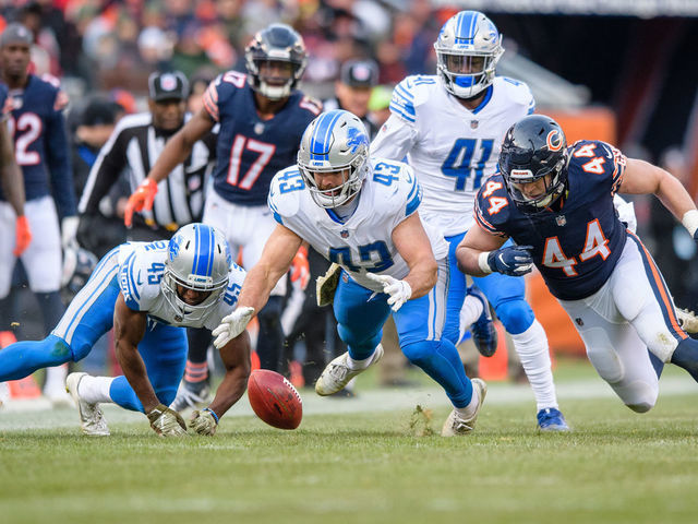 CHICAGO, IL - NOVEMBER 11: Detroit Lions fullback Nick Bellore (43) recovers and onside kick in the 4th quarter during an NFL football game between the Detroit Lions and the Chicago Bears on November 11, 2018, at Soldier Field in Chicago, IL.