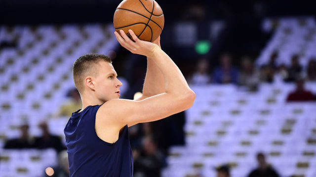 OAKLAND, CA - MARCH 23: Kristaps Porzingis #6 of the Dallas Mavericks warms up before the game against the Golden State Warriors on March 23, 2019 at ORACLE Arena in Oakland, California. NOTE TO USER: User expressly acknowledges and agrees that, by downloading and or using this photograph, user is consenting to the terms and conditions of Getty Images License Agreement. Mandatory Copyright Notice: Copyright 2019 NBAE