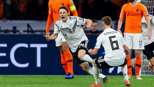 AMSTERDAM, NETERLANDS - MARCH 24: Nico Schulz of Germany celebrates after scoring his team's third goal during the 2020 UEFA European Championships group C qualifying match between Netherlands and Germany at Johan Cruijff ArenA on March 24, 2019 in Amsterdam, Netherlands.