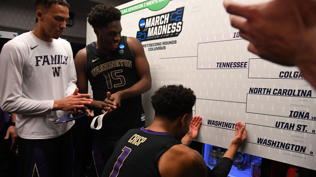 COLUMBUS, OH - MARCH 22: David Crisp #1 of the Washington Huskies updates the locker room bracket after their win over the Utah State Aggies in the first round of the 2019 NCAA Men's Basketball Tournament held at Nationwide Arena on March 22, 2019 in Columbus, Ohio.