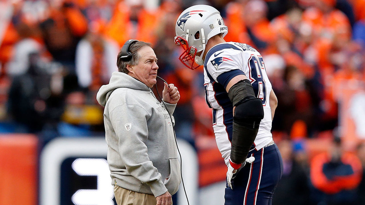 DENVER, CO - JANUARY 24: Head coach Bill Belichick of the New England Patriots speaks to Rob Gronkowski #87 in the fourth quarter against the Denver Broncos in the AFC Championship game at Sports Authority Field at Mile High on January 24, 2016 in Denver, Colorado.