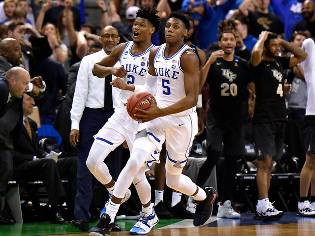 COLUMBIA, SC - MARCH 24: (EDITORS NOTE: Retransmission with alternate crop.) Cam Reddish #2 and RJ Barrett #5 of the Duke Blue Devils celebrate following their 77-76 win against the Central Florida Knights during the second round of the 2019 NCAA Men's Basketball Tournament at Colonial Life Arena on March 24, 2019 in Columbia, South Carolina.