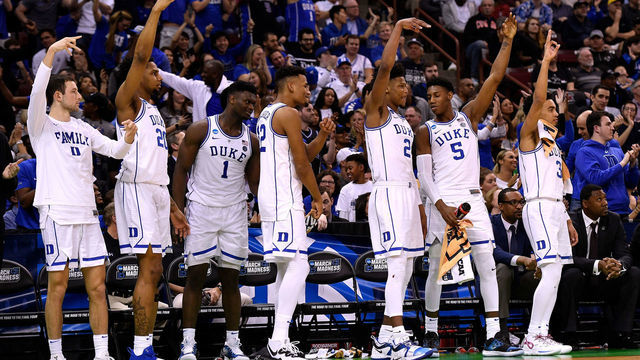 COLUMBIA, SC - MARCH 22: (L-R) Brennan Besser #53, Marques Bolden #20, Zion Williamson #1, Javin DeLaurier #12, Cam Reddish #2, RJ Barrett #5 and Tre Jones #3 of the Duke Blue Devils react from their bench in the second half of their game against the North Dakota State Bison during the first round of the 2019 NCAA Men's Basketball Tournament at Colonial Life Arena on March 22, 2019 in Columbia, South Carolina.