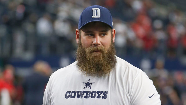 ARLINGTON, TX - DECEMBER 23: Dallas Cowboys Center Travis Frederick watches warm ups prior to the game between the Tampa Bay Buccaneers and Dallas Cowboys on December 23, 2018 at AT&T Stadium in Arlington, TX.