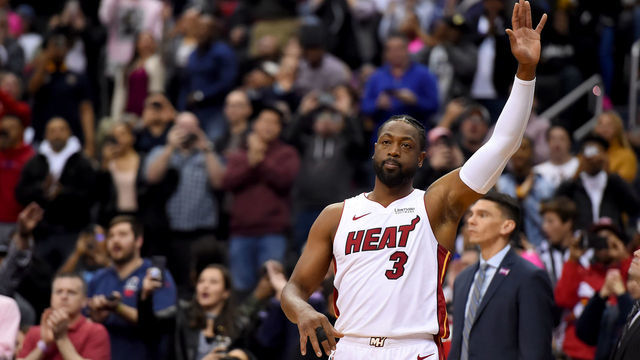 WASHINGTON, DC - MARCH 23: Dwyane Wade #3 of the Miami Heat reacts to a standing ovation prior to entering the game against the Washington Wizards during the first half at Capital One Arena on March 23, 2019 in Washington, DC.