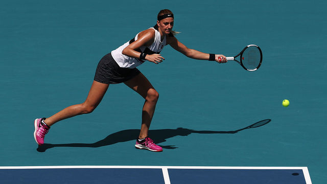 MIAMI GARDENS, FLORIDA - MARCH 25: Petra Kvitova of the Czech Republic in action against Caroline Garcia of France during day 8 of the Miami Open presented by Itau at Hard Rock Stadium on March 25, 2019 in Miami Gardens, Florida.