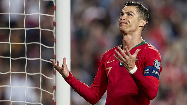 LISBON, PORTUGAL - MARCH 25: Cristiano Ronaldo of Portugal reacts during the 2020 UEFA European Championships group B qualifying match between Portugal and Serbia at Estadio do Sport Lisboa e Benfica on March 25, 2019 in Lisbon, Portugal.