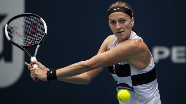MIAMI GARDENS, FLORIDA - MARCH 25: Petra Kvitova of the Czech Republic hits a backhand against Caroline Garcia of France in the 4th Round of the women's singles at the Miami Open on March 25, 2019 in Miami Gardens, Florida.