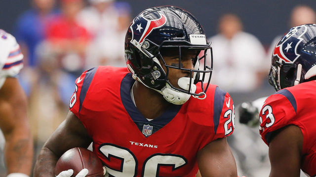 HOUSTON, TX - OCTOBER 14: Lamar Miller #26 of the Houston Texans rushes with the ball against the Buffalo Bills during a football game against the Buffalo Bills at NRG Stadium on October 14, 2018 in Houston, Texas.