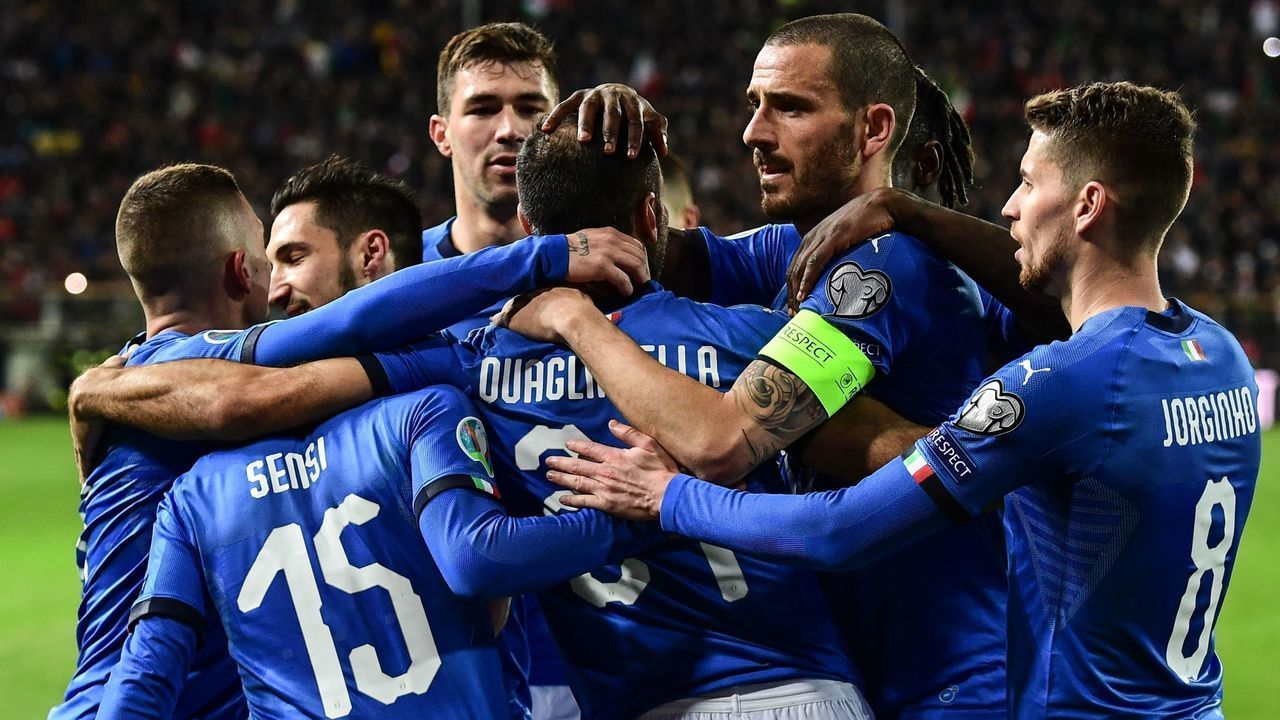Italy's forward Fabio Quagliarella (C) celebrates with teammates after scoring a penalty during the Euro 2020 Group J qualifying football match Italy vs Liechtenstein on March 26, 2019 at the Ennio-Tardini stadium in Parma.