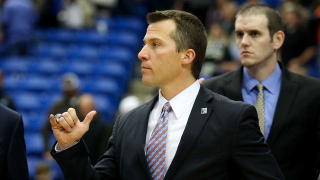 ARLINGTON, TX - FEBRUARY 04: Texas-Arlington Mavericks head coach Scott Cross participates in the school fight song after the college basketball game against the Texas State Bobcats at College Park Center on February 4, 2017 in Arlington, Texas