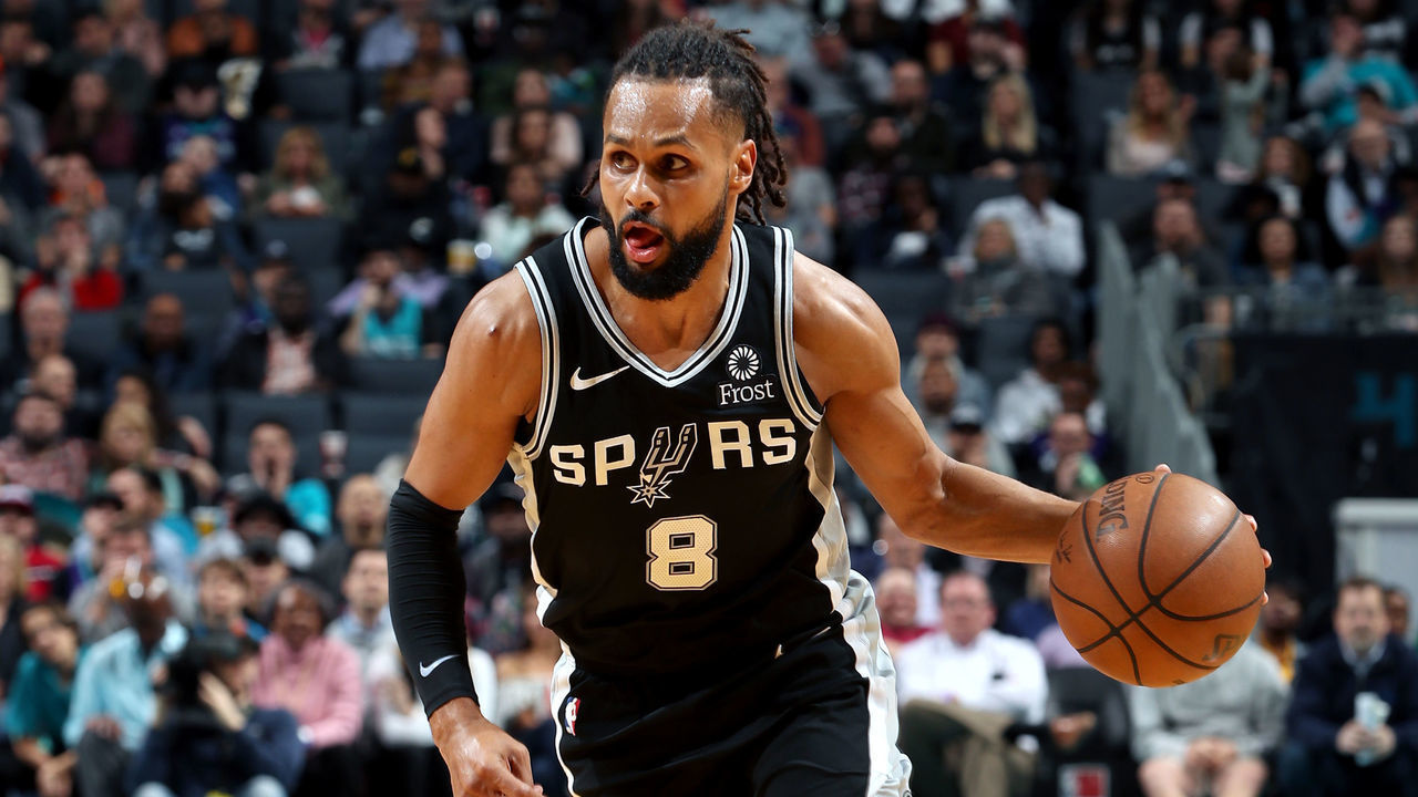 CHARLOTTE, NC - MARCH 26: Patty Mills #8 of the San Antonio Spurs handles the ball against the Charlotte Hornets on March 26, 2019 at the Spectrum Center in Charlotte, North Carolina. NOTE TO USER: User expressly acknowledges and agrees that, by downloading and/or using this photograph, user is consenting to the terms and conditions of the Getty Images License Agreement. Mandatory Copyright Notice: Copyright 2019 NBAE