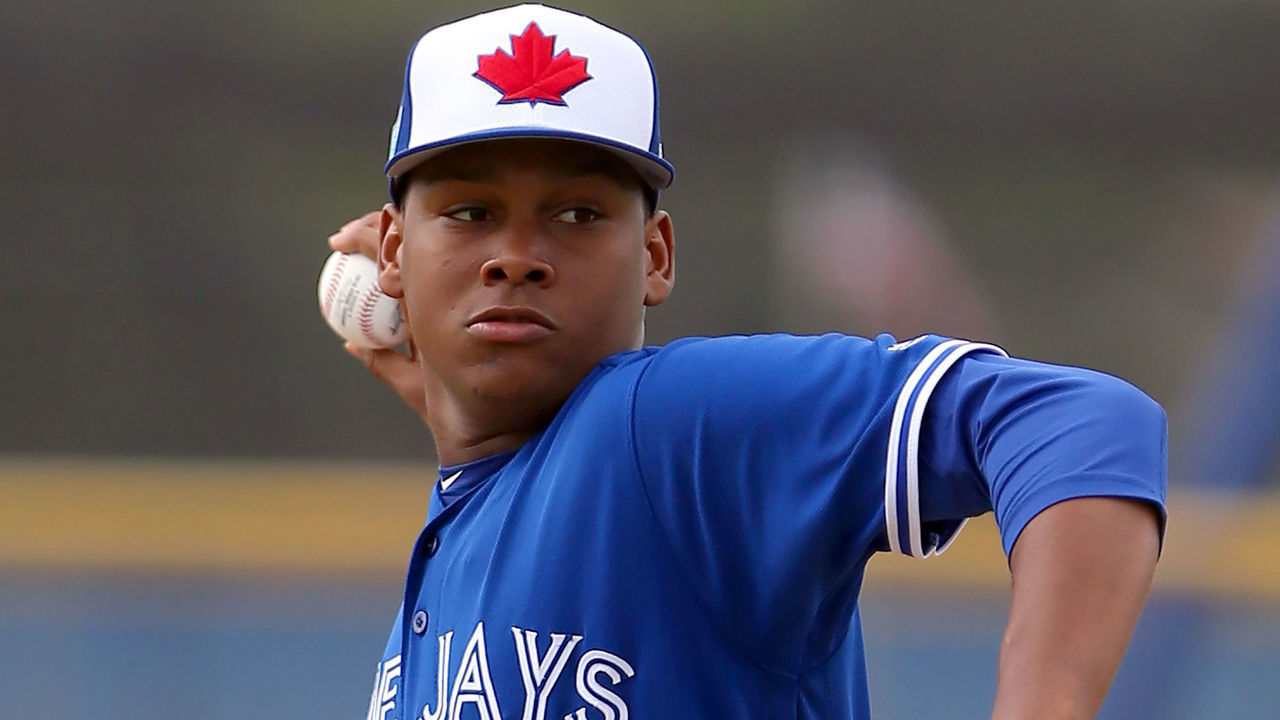 Dunedin, FL - FEB 18: Elvis Luciano (65) delivers a pitch to the plate during the Toronto Blue Jays spring training workout on February 18, 2019, at the Bobby Mattick Training Center at Englebert Complex in Dunedin, FL.