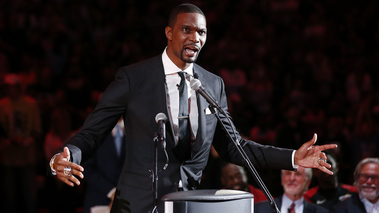 MIAMI, FLORIDA - MARCH 26: Former Miami Heat player Chris Bosh reacts during his jersey retirement ceremony at halftime of the game between the Miami Heat and the Orlando Magic at American Airlines Arena on March 26, 2019 in Miami, Florida.
