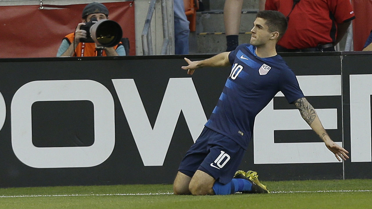 HOUSTON, TEXAS - MARCH 26: Christian Pulisic #10 of the USA celebrates after scoring during the first half against Chile at BBVA Compass Stadium on March 26, 2019 in Houston, Texas.
