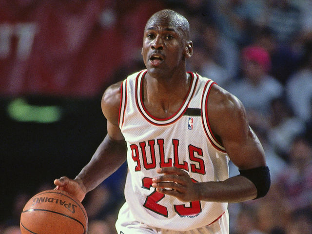 CHICAGO - CIRCA 1992: Michael Jordan #23 of the Chicago Bulls dribbles against the Portland Trailblazers during the 1992 NBA Finals circa 1992 at Chicago Stadium in Chicago, Illinois. Mandatory Copyright Notice: Copyright 1992 NBAE