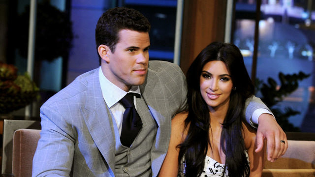 BURBANK, CA - OCTOBER 04: NBA player Kris Humphries (L) and his wife reality TV personality Kim Kardashian appear on the Tonight Show With Jay Leno at NBC Studios on October 4, 2011 in Burbank, California.