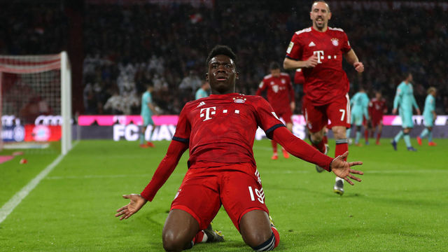 MUNICH, GERMANY - MARCH 17: Alphonso Davies (L) of FC Bayern Muenchen celebrates his first goal for Bayern Muenchen with teammate Franck Ribery during the Bundesliga match between FC Bayern Muenchen and 1. FSV Mainz 05 at Allianz Arena on March 17, 2019 in Munich, Germany.